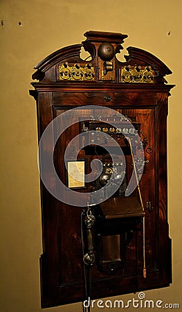 Inside of Pena Palace in Sintra, Lisbon district, Portugal. Antique wood telephone. Editorial Stock Photo