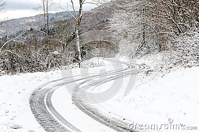 Sinuous road in winter Stock Photo