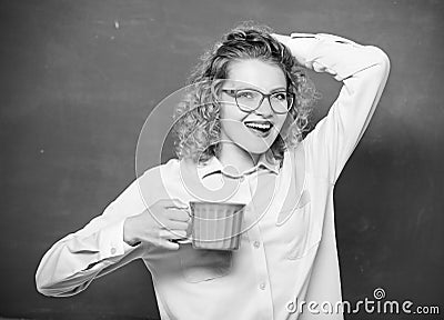 Sip recharging body and mind. Dose of caffeine. Back to school. Energy charge for whole day. Teacher eyeglasses drink Stock Photo