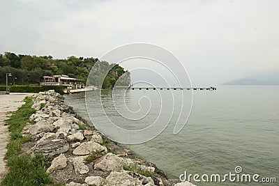 Sirmione and sea beach, Italy Stock Photo