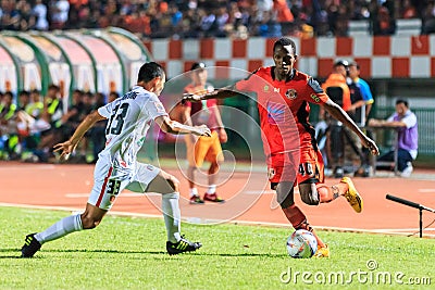 SISAKET THAILAND-FEBRUARY 18: Adefolarin Durosinmi (orange) of S Editorial Stock Photo