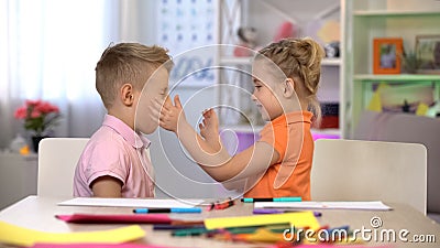 Sister and brother fooling around, having fun together, spending leisure time Stock Photo