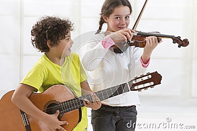 Sister and Brother playing music Stock Photo