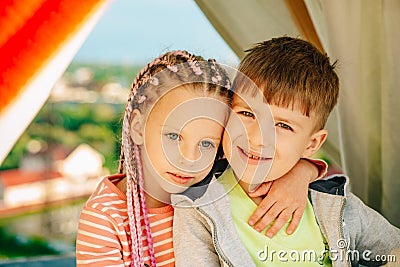 Sister brother relationships. Kids playing outdoor. Summer camping. Children in homemade tent. Cute kids camping. Having Stock Photo