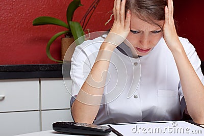 Sister with burnout and headache Stock Photo
