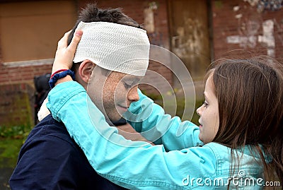 Sister gives first aid Stock Photo