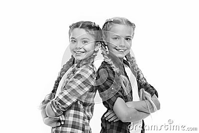 Sisterhood is unconditional love. Girls sisters stand back to back confidently. Friendship support and trust. Sisterhood Stock Photo