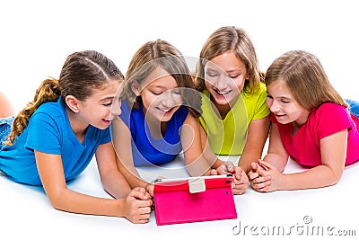 Sisters kid girls with tech tablet pc playing happy Stock Photo