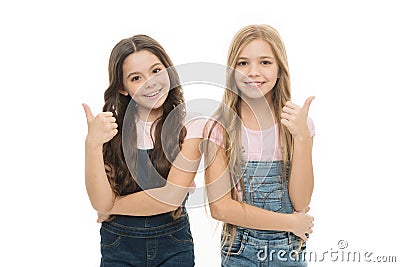 Sisters kids isolated white background. Sisterly relationship. Sisterhood happiness. Girls confident sisters. Sisterhood Stock Photo