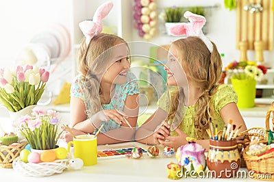 Sisters preparing for Easter in the kitchen Stock Photo