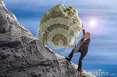 Sisyphus metaphor man rolling huge rock ball up hill Stock Photo