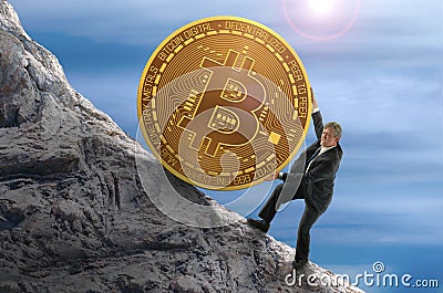 Sisyphus concept showing man struggling to push giant Bitcoin up a mountain representing goal of mining and getting rich Stock Photo