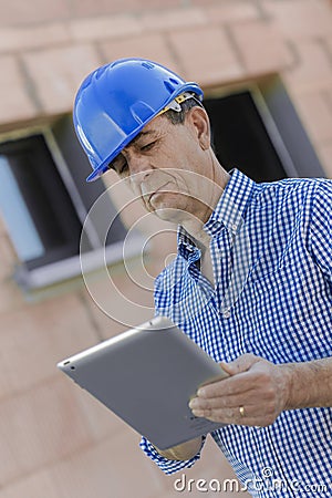 Site surveyor using tablet Stock Photo