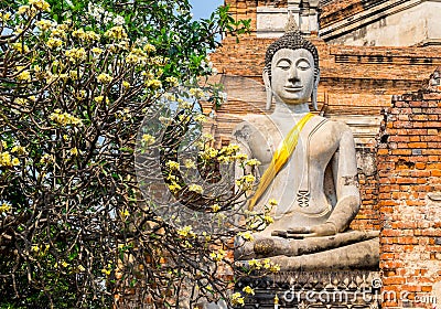 Sitting buddha at Wat YAI CHAI MONGKOL HISTORIC SITE IN AYUTTHAYA,PHRA NAKHON SI AYUTTHAYA PROVINCE,THAILAND. Stock Photo