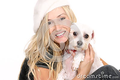 Sitting girl cuddling a dog Stock Photo