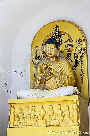 Sitting golden Buddha-Shanti stupa,Ladakh,India Stock Photo