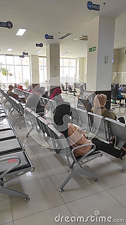 Sitting and waiting in waiting room - stock photo Editorial Stock Photo