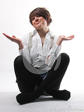 Sitting woman in a Turkish manner with spread hand Stock Photo