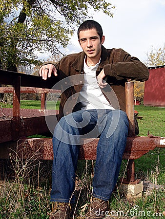 Sitting Young Man Stock Photo