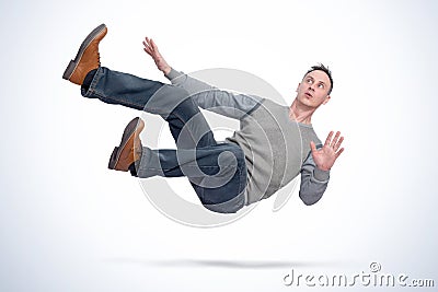 Situation, the man in casual clothes is falling. Concept of an accident Stock Photo