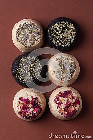 Six solid natural shampoo bars, zero waste concept on brown background Stock Photo