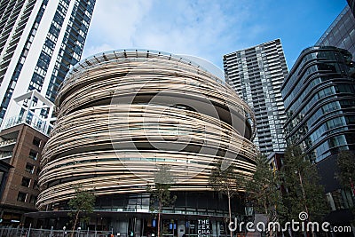 The six-storey building called the Exchange, the Kengo Kuma designed bird`s nest structure at Darling Square. Editorial Stock Photo