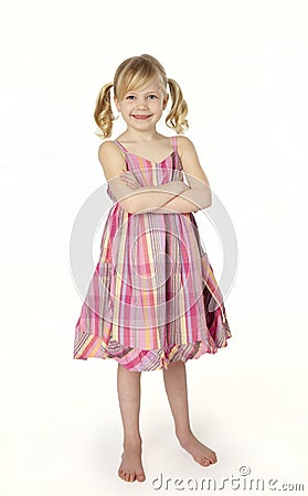 Six Year Old Girl Standing on White Background Stock Photo