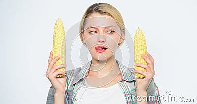 Size concept. healthy teeth. Farming, farmer girl with maize. corn crop. vitamin and dieting food. agriculture and Stock Photo