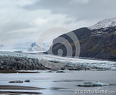Skaftafellsjokull glacier, Iceland. Glacier tongue slides from the Vatnajokull icecap or Vatna Glacier near subglacial Esjufjoll Stock Photo
