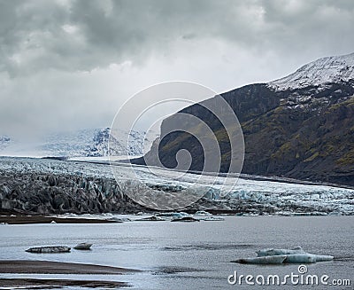 Skaftafellsjokull glacier, Iceland. Glacier tongue slides from the Vatnajokull icecap or Vatna Glacier near subglacial Esjufjoll Stock Photo