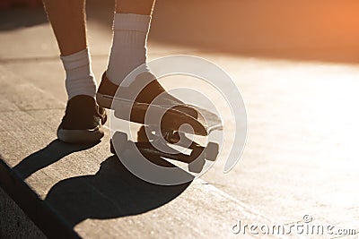 Skateboard and feet. Stock Photo