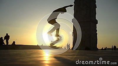 Skateboard jump. Skateboarding silhouette person jumping. Artificial slow motion footage Skateboard jump. Skateboarding silhouette person jumping. Artificial slow motion footage