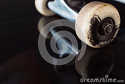 Skateboard truck and wheels on glance background Stock Photo