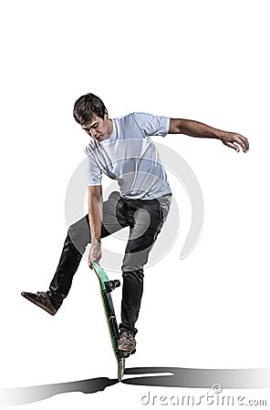 Skateboarder making trick isolated on white Stock Photo