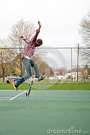 Skateboarder Performing Tricks Stock Photo