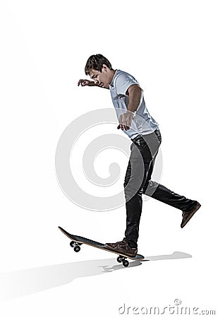 Skateboarder riding on one leg isolated Stock Photo