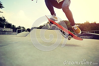 Skateboarding at a skateboard park Stock Photo