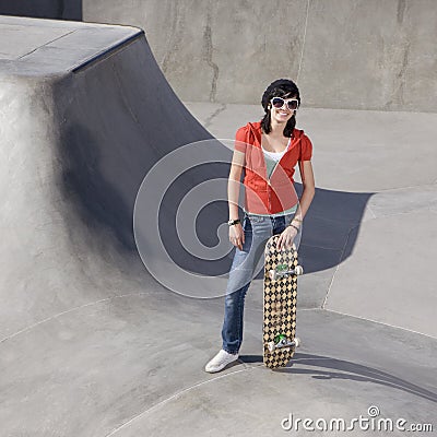 Skater girl at a park Stock Photo