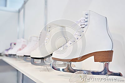 Skates for figure skating on show window Stock Photo