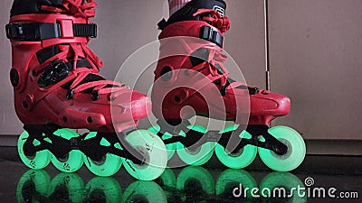 Skates with photoluminescent wheels. When illuminated they catch the light and then glow in the dark Stock Photo