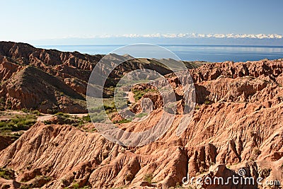 View of Skazka, or Fairytale, canyon and Issyk-Kul lake. Kyrgyzstan Stock Photo