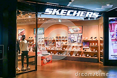 Skechers famous shoe brand store showcase with logo and entrance area in Shanghai, China Editorial Stock Photo