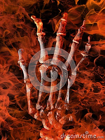 Skeletal hand in flames Stock Photo