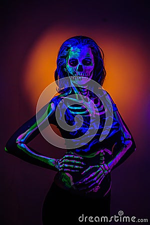 Skeleton bodyart with blacklight Stock Photo