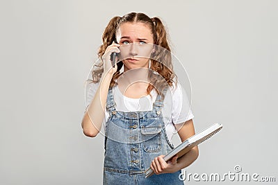 Skeptic girl portrait disturbing phone call mobile Stock Photo