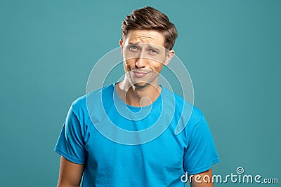 Skeptic male portrait puzzled face disbelief Stock Photo