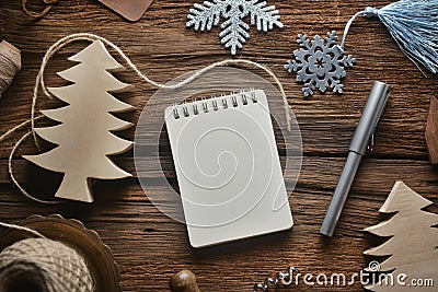 Sketchbook on wooden table in Christmas theme Stock Photo