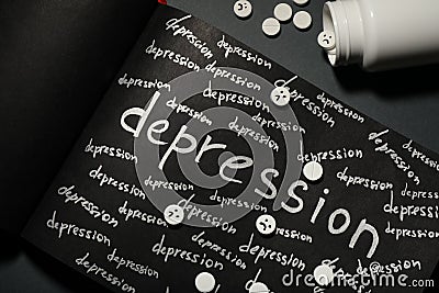 Sketchbook with words Depression and pills on black table, flat lay Stock Photo