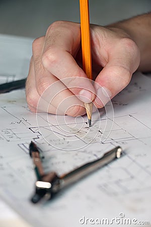 Sketching on the Mechanical engineer`s desktop Stock Photo