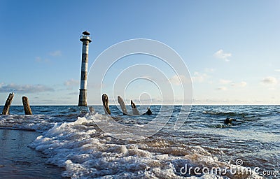 Skew lighthouse in the Baltic Sea. Stock Photo